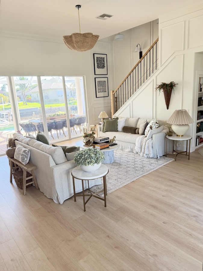 Great room with a two-story paneled wall