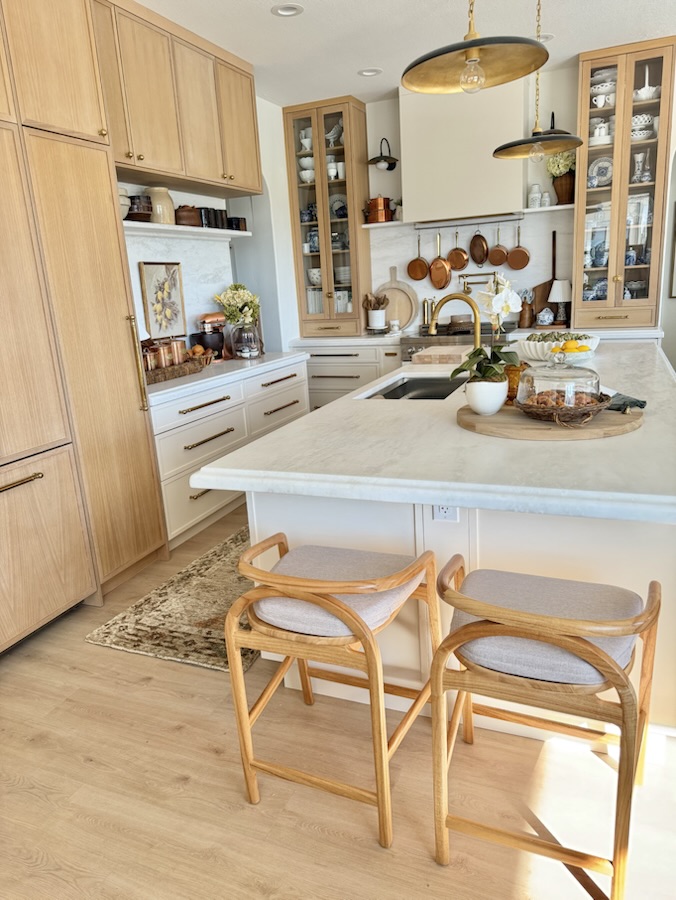 Glass-front cabinets and open shelving