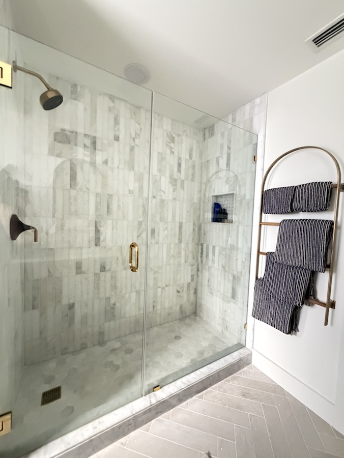 Glass-enclosed shower
